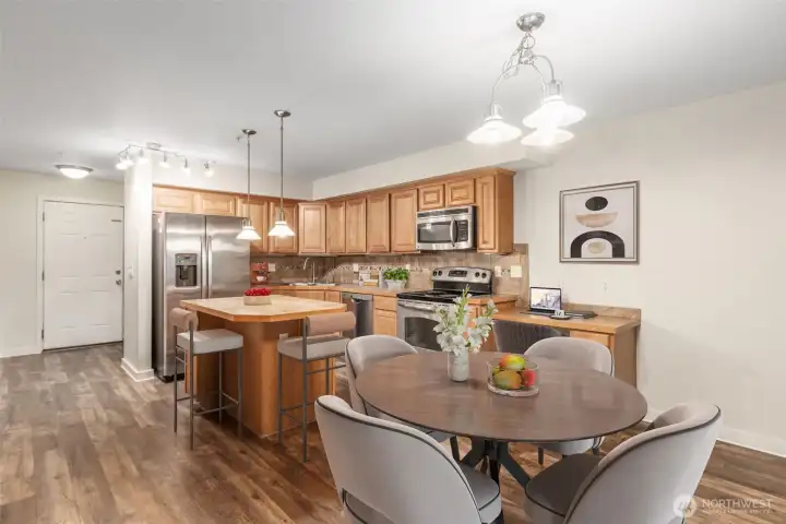 Virtual staging in kitchen and living room to show layout potential