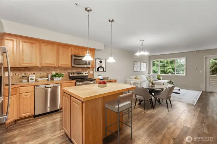 Virtual staging in kitchen and living room to show layout potential