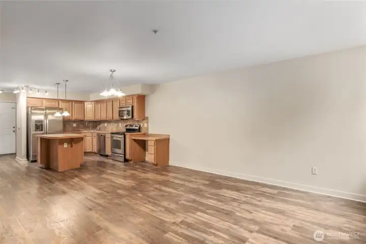 Open concept living room and kitchen area makes for ideal hosting layout