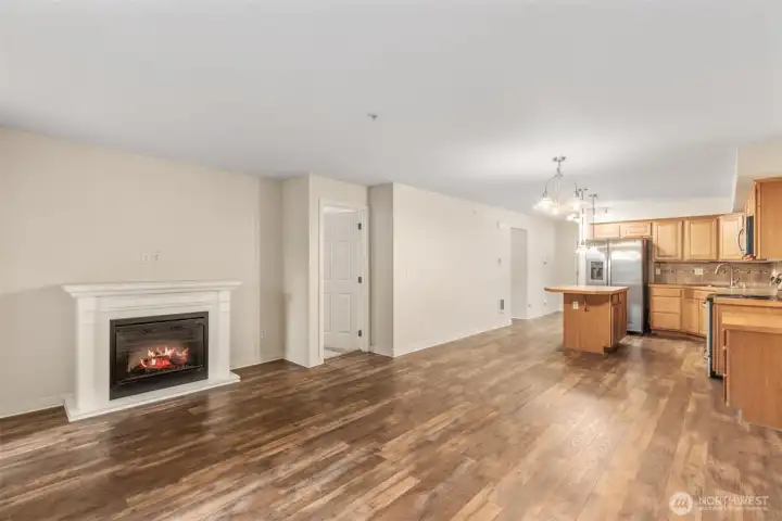 Open concept living room and kitchen area makes for ideal hosting layout