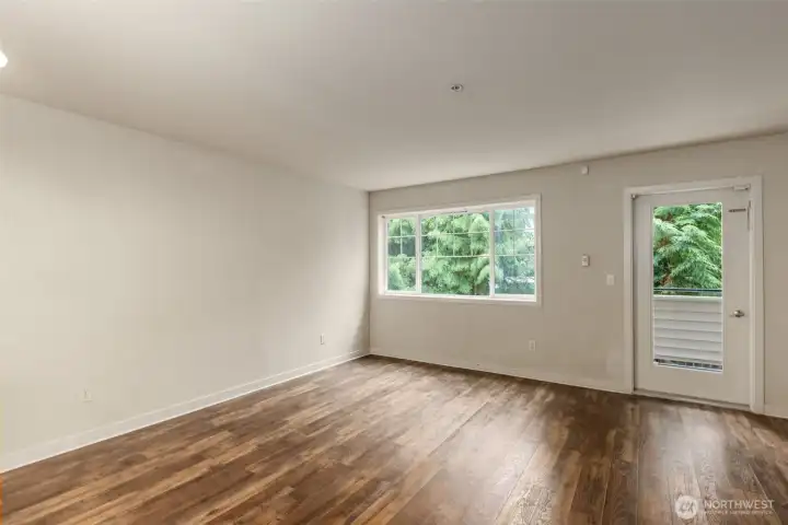 Open living room with balcony access