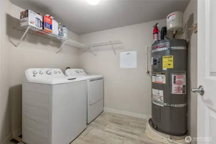 Large mudroom off entry. Washer and dryer included in sale.