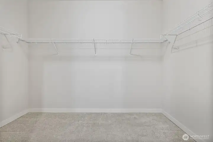 Extra large walk-in closet in the primary bedroom