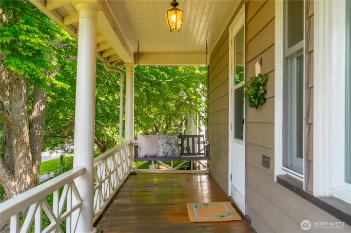 Covered patio with secluded porch swing