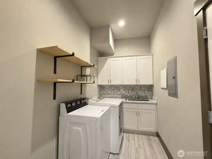 Main Level Laundry & Mud Room - Connects to 744 SF 3 Car Garage Garage!