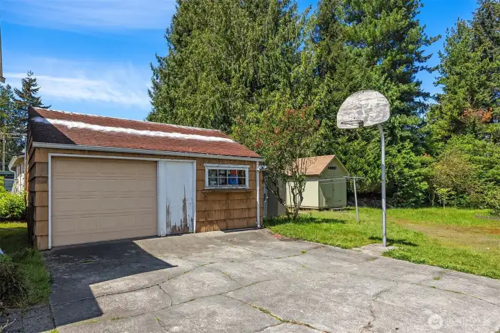 Detached 369 SF garage/shop structure provides storage, workspace and support for tenants, owners or contractors.