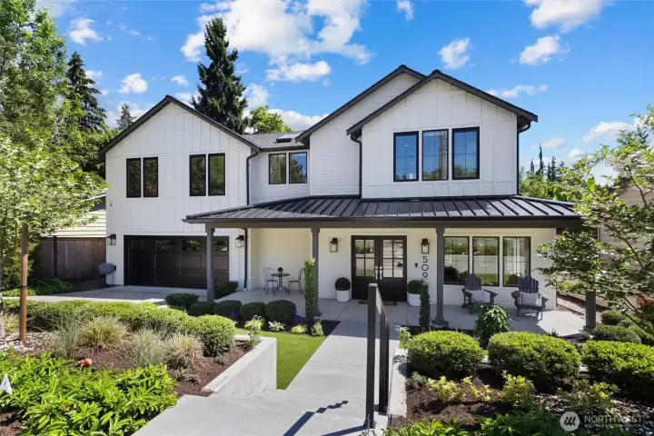 Front of this like-new Imagine Homes resale just near downtown Kirkland waterfront, shops & dining. Low maintenance plants with in-ground irrigation and turf