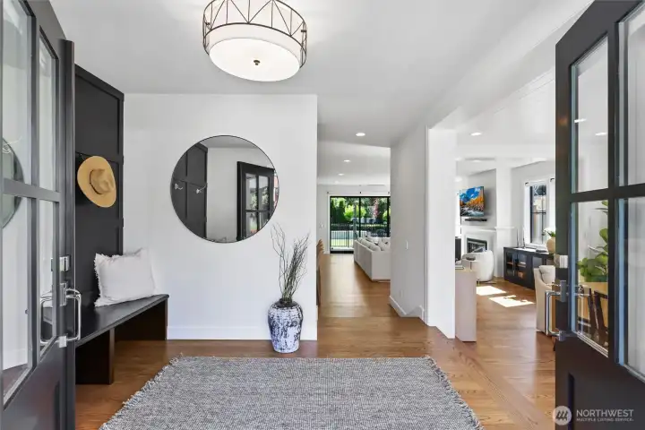 Grand double door entry into front mudroom area and foyer