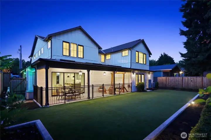 Backyard with covered entertaining patio and low maintenance turf, in-ground Rain Bird irrigation system