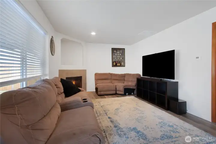 The living room is also nice sized. Gas fireplace and new flooring. You can just move in.