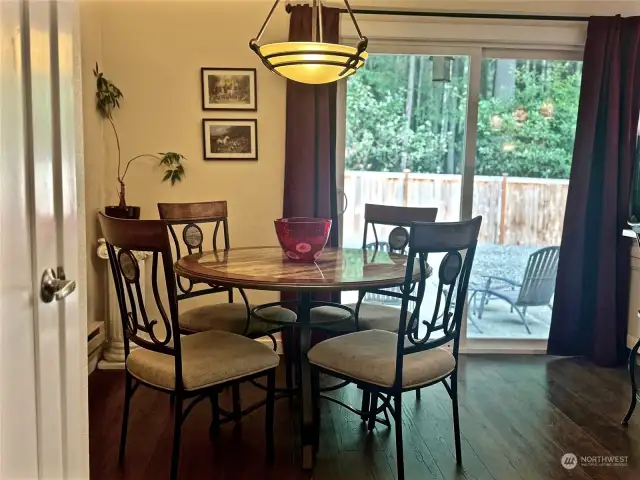 dining area opens to rear yard and patio