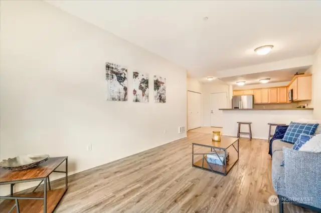 So much natural lighting in this spacious living area!