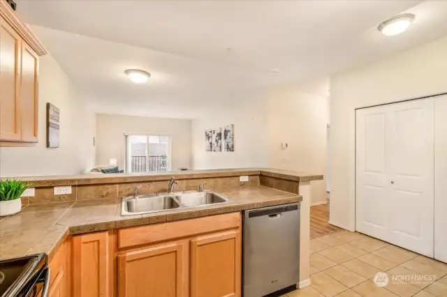 Wide open living space with a closet to use for your pantry!