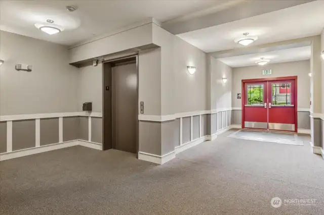 Your secured building entrance with your elevator to your secured covered parking garage!