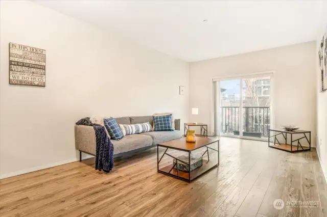 Spacious living area looking towards your balcony!