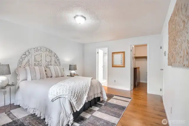 primary bedroom with 3/4 bathroom and walk-in closet...