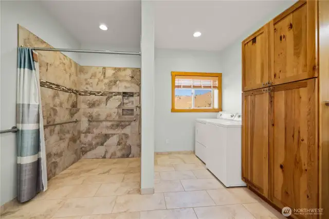 The shower is designed to accommodate a wheel chair if needed. The shower floors are heated.