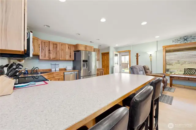 The homes entrance is the doorway from the patio.  This allows entry into the spacious living/dining/ kitchen area.  A sharp turn to the right as entering will take you to the primary bedroom.