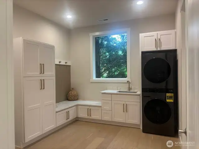 Mud Room With Washer and Dryer on Main level.