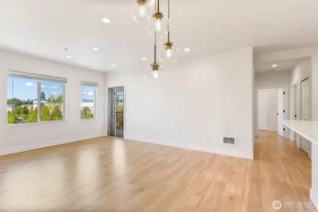 Ample natural light and door to patio