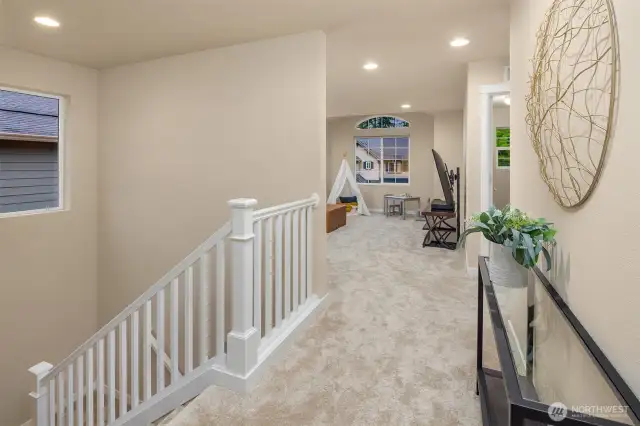 Upper-level landing with plush new carpeting throughout