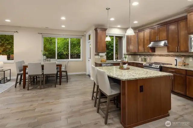 Newer engineered flooring throughout the entire main level of the home