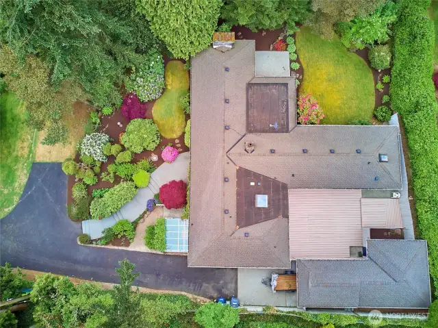 Stunning grounds surround this ranch-style mid-century modern home.