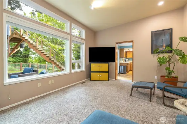 Enjoy views of the backyard and plenty of light thanks to the large windows.