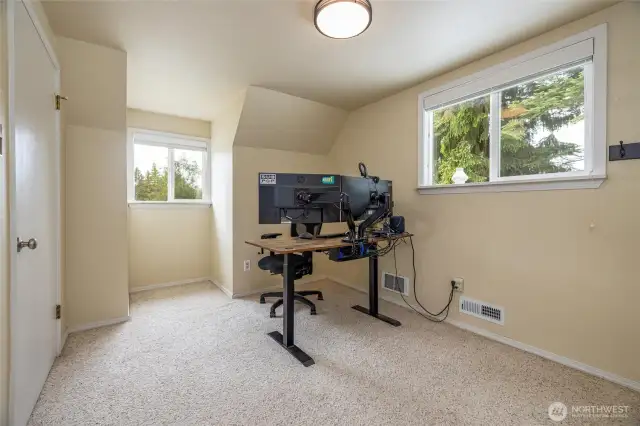 The 3rd bedroom upstairs, or could be an office.