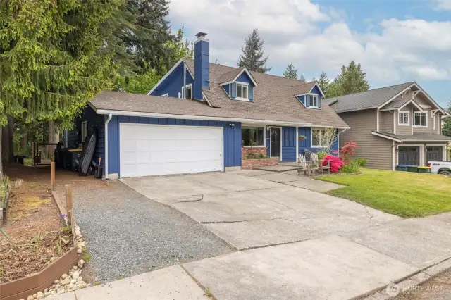 There is space on the side of the house for storage and parking.