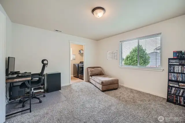 Spacious mid room just off garage