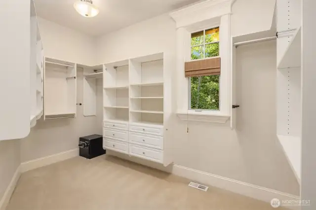 Huge walk in closet with adjoins primary bathroom.