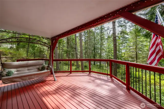 A wonderful covered deck for lounging in the afternoon