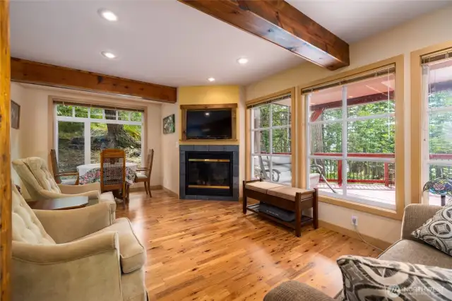 Cozy around the downstairs fireplace all year round