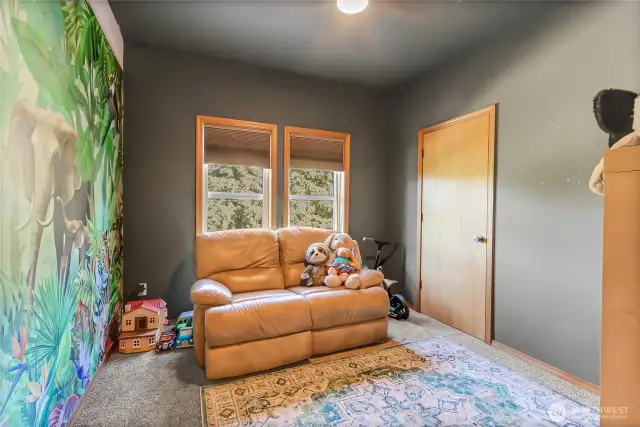 one of the many bedrooms this home offers