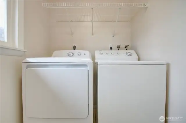 Laundry area with newer washer and dryer