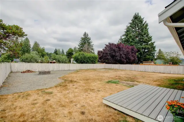 Spacious backyard ready for play, pets, or summer barbecues.