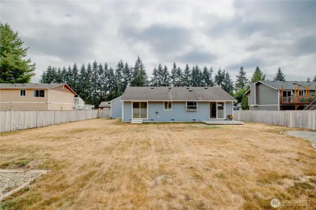 Plenty of room to play, garden, or add your own touches to this spacious yard