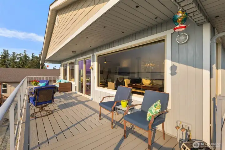 Enough space on the deck for multiple distinct seating areas.