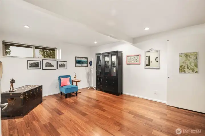 Lower level office/den is incredibly spacious and has a built in murphy bed.