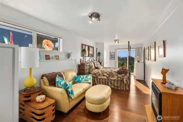 Lower level family room with slider out to the beautifully landscaped backyard.