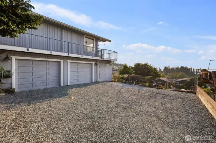 2 car garage with plenty of driveway parking too.