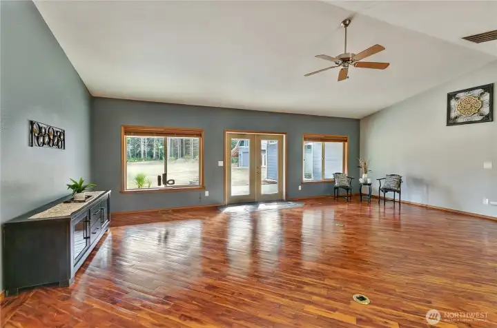 Let the light in, not the cords - French doors bring the outdoors in, floor outlet keeps the wires out