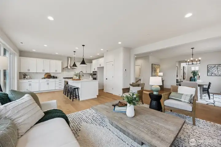 Spacious kitchen opens to living room with gorgeous mountain and territorial views.
