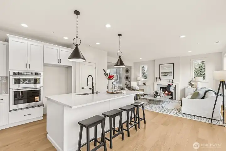 Photo of kitchen, model home on lot 4 at Moorlands Grove. Stunning mountain and territorial views. Home backs to protected space.
