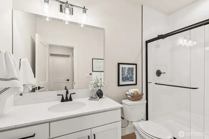 Photo of lower level, basement bathroom on lot 4 at Moorlands Grove.  Bedroom and bonus room in basement.