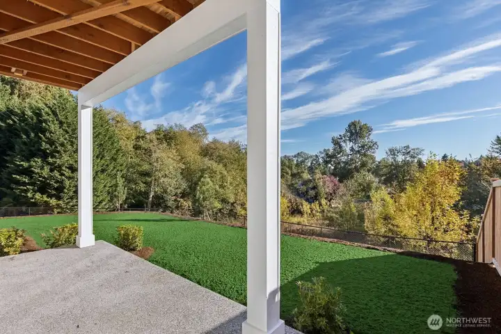 Covered patio, beautiful views and spacious yard on lot 4 at Moorlands Grove.