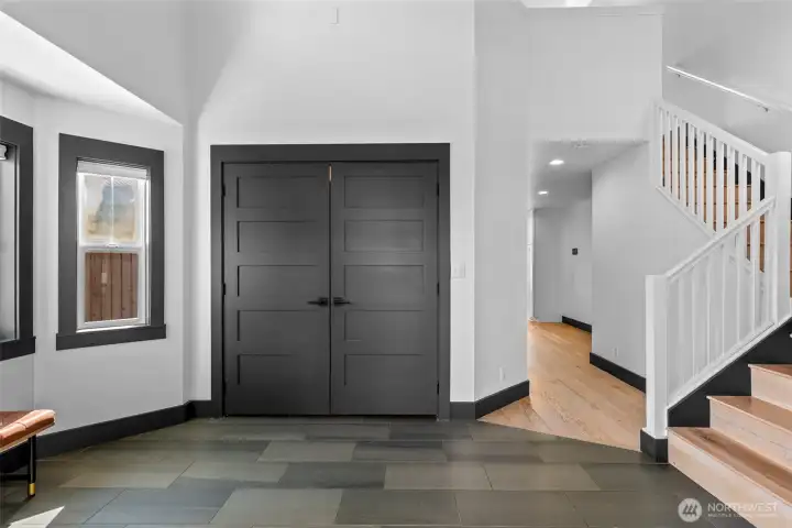 Well-designed entry offering clear flow to living spaces and access to the upper level