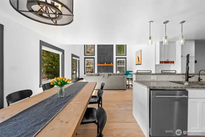 Dining area seamlessly connected to kitchen and living spaces, creating an ideal layout for everyday living and entertaining