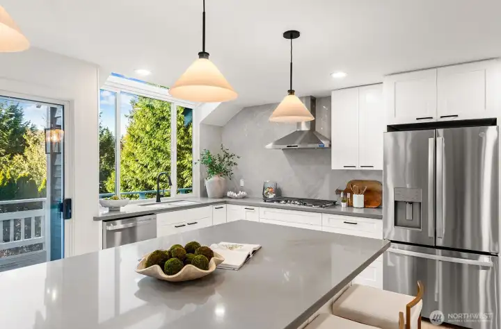 Gas stove top with overhead fan